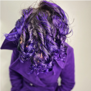 purple and black curly hair